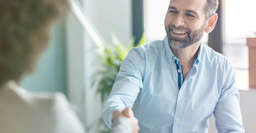 man and woman handshake